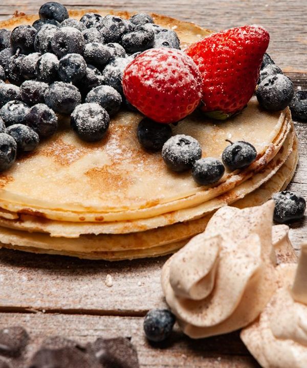 Stack of pancakes with berries